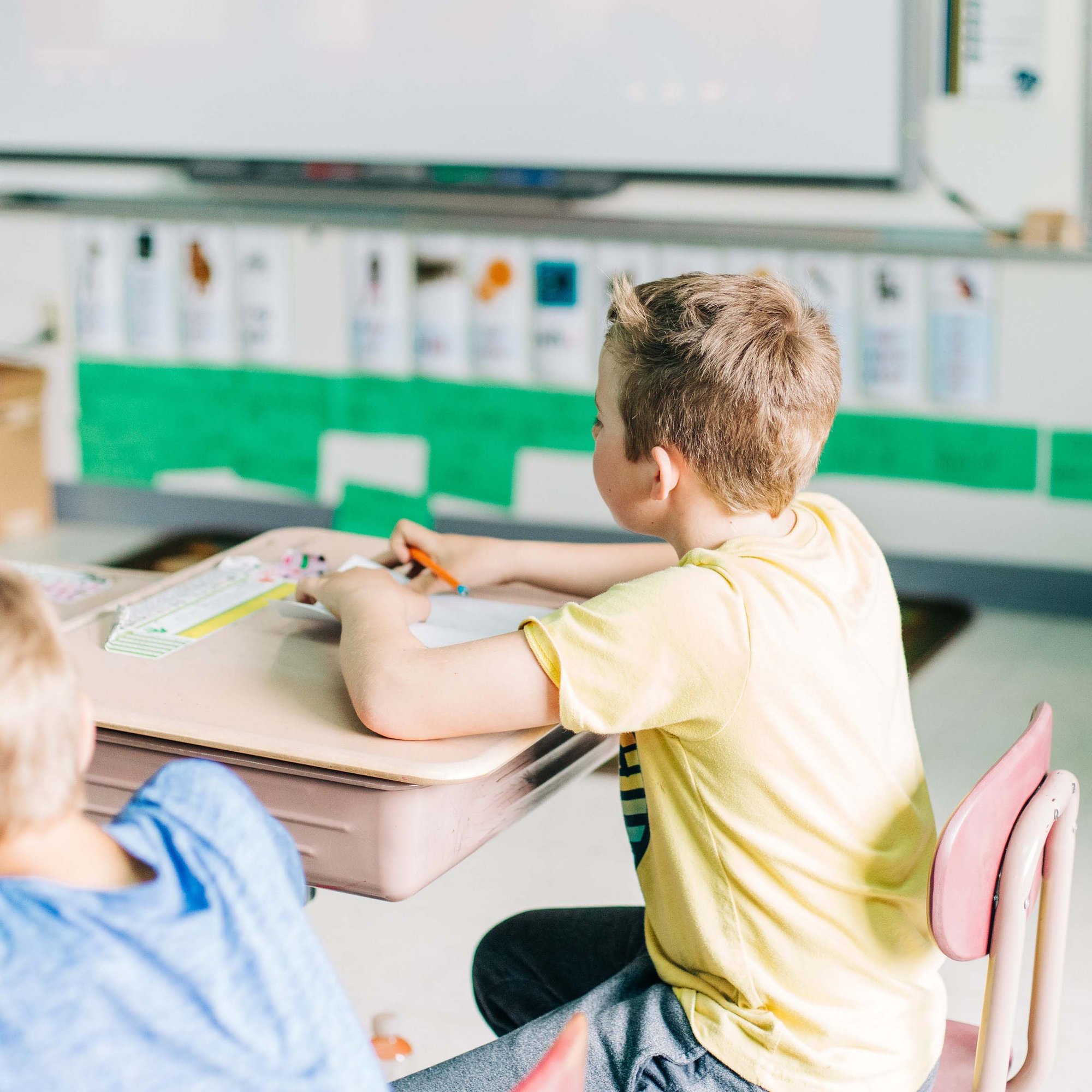 Kid in classroom - Taste Buds